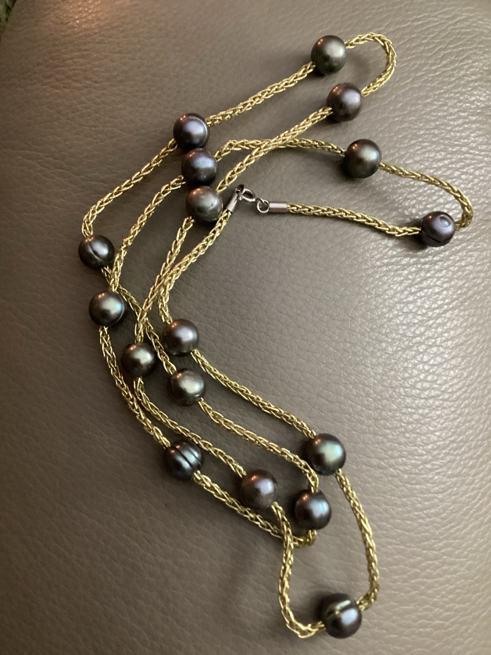 Gold Multi-Strand Necklace with Dark Gray Pearls